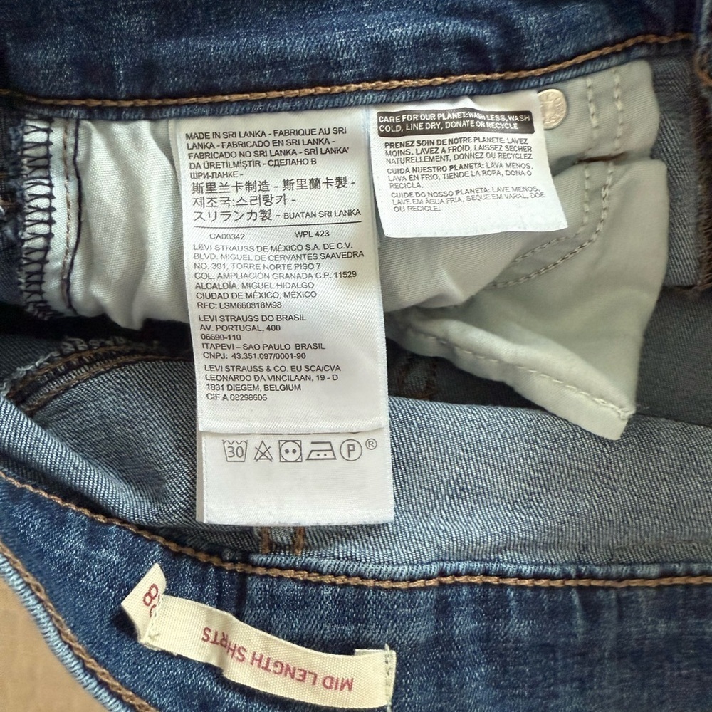 Levi's Blue Jean Shorts with Distressed Cuffed Hem - Picture 7 of 8